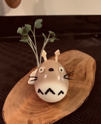 a Ramen egg decorated as Totoro