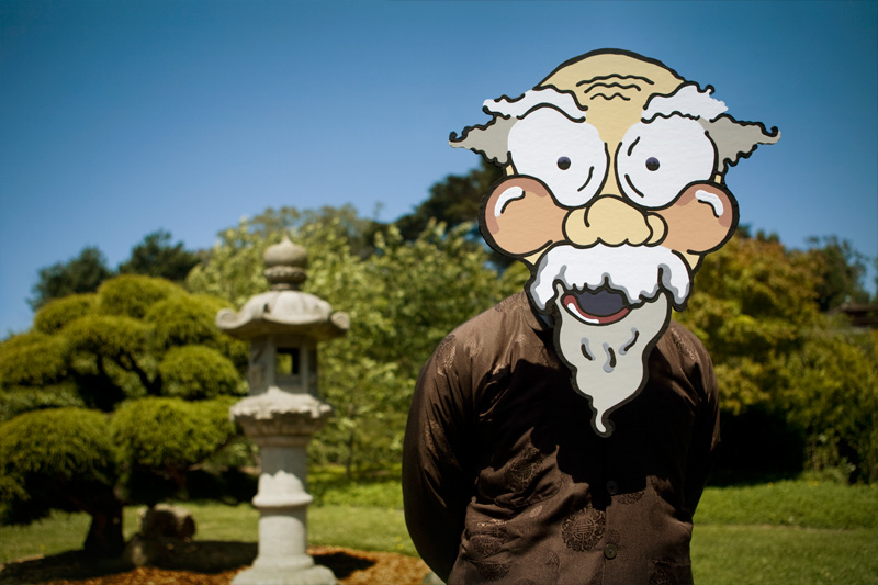 cardboard old man in a japanese garden